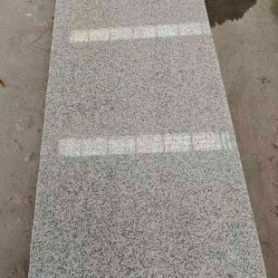 三沙芝麻白光面毛板