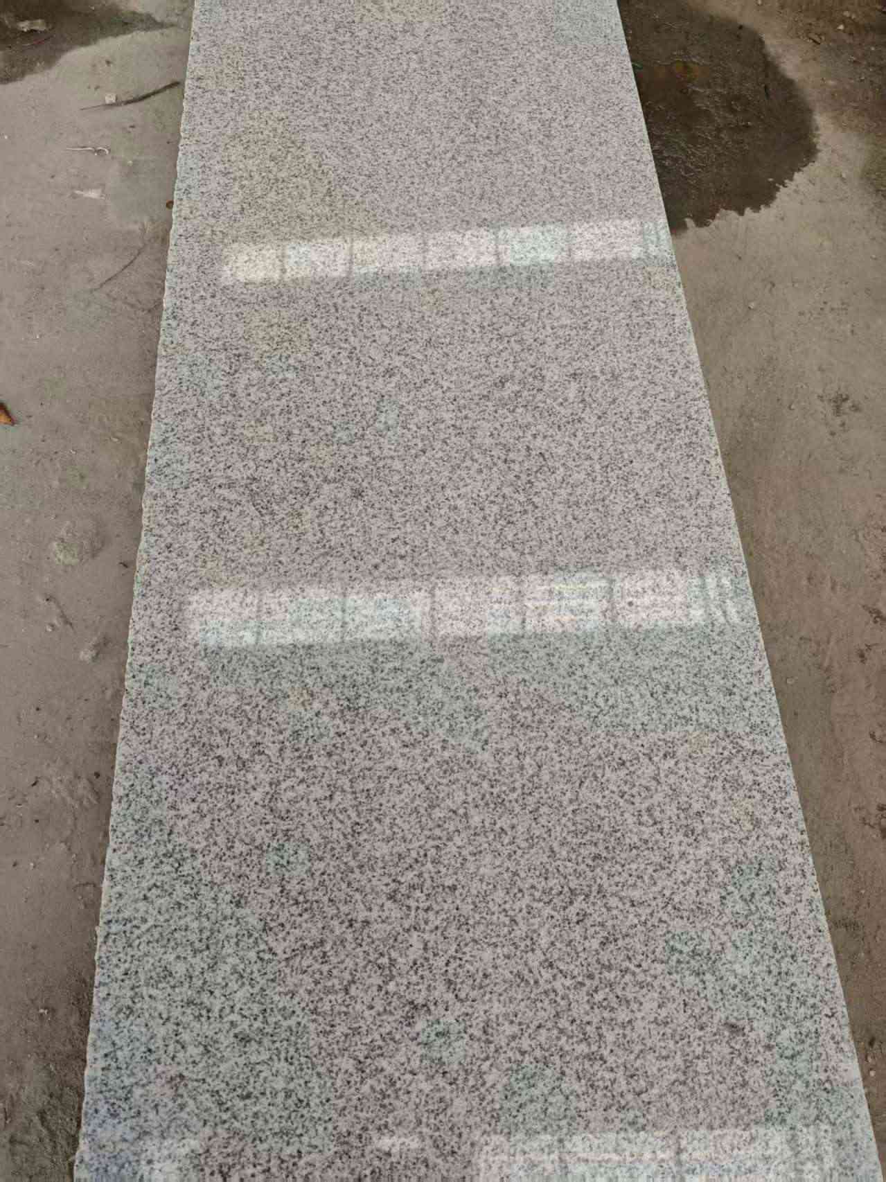 三沙芝麻白光面毛板